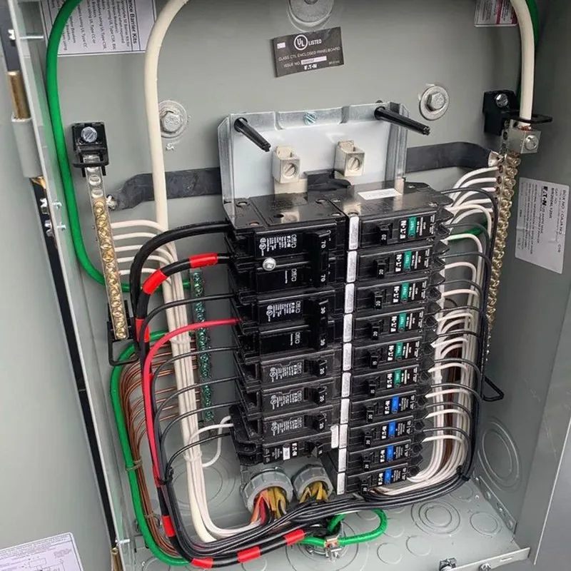 Neatly wired residential breaker panel with the cover off